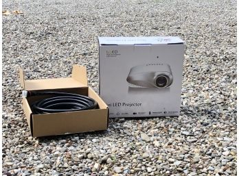Xinda Mini LED Projector With High Speed HDMI Cord. New In Box, Never Used.