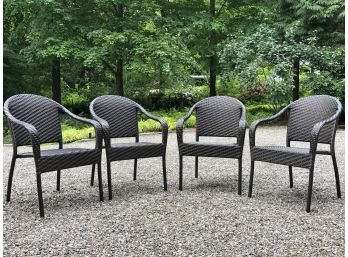 Four Frontgate Stackable Wicker Chairs