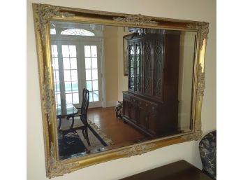 Carved And Gilt Beveled Glass Mirror