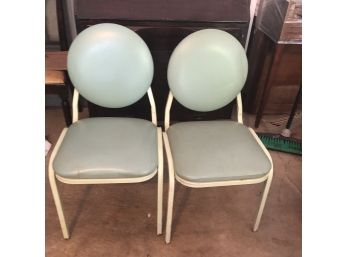 2 Green Stack Chairs