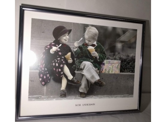 Photograph By Kim Anderson Of Well Dressed Boy And Girl Sitting Eating Ice Cream From Cone With Spoons