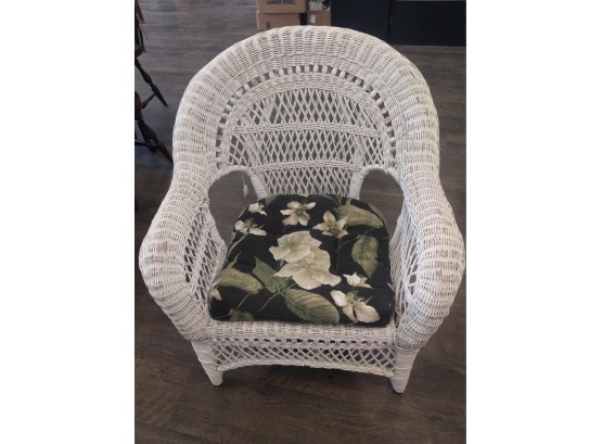 White Wicker Armchair With Floral Cushion