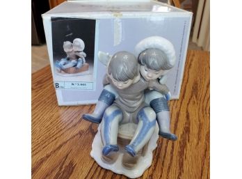 Lladro Hand- Made In Spain No. 5665. Children Sledding 'Hang On'. Comes With Original Lladro Box