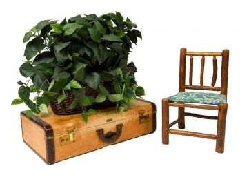 Vintage Leather Suit Case Faux Floral Arrangement And Child's Wooden Chair