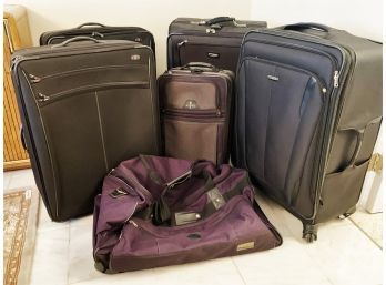 Group Of Rolling Luggage - Six Pieces