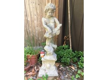 A Boy With A Sea Shell In His Hands. Vintage Cement Garden Statue.
