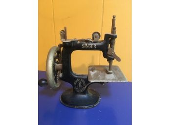 Antique Singer Child Sewing Machine.