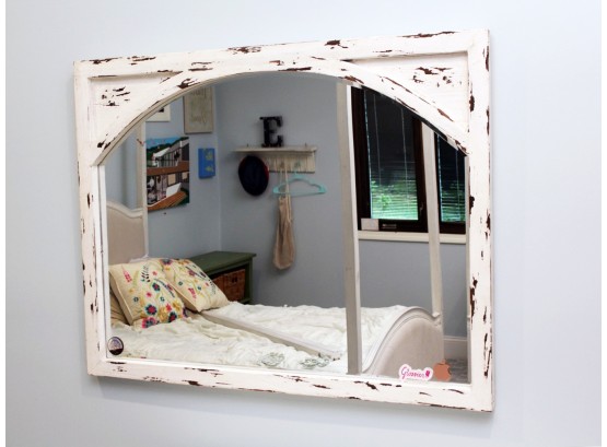 A Large Faux Distressed Wood Framed Mirror
