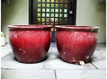 A Pair Of Large Glazed Earthenware Planters