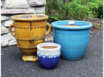 An Assortment Of Glazed Earthenware Planters