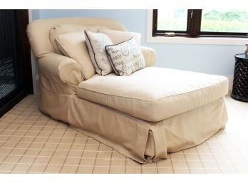 A Comfortable Skirted Chaise Lounge In Ecru Linen