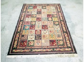 A Hand Knotted Wool Indo-Persian Rug