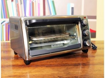 A Stainless Steel Toaster Oven By Black & Decker