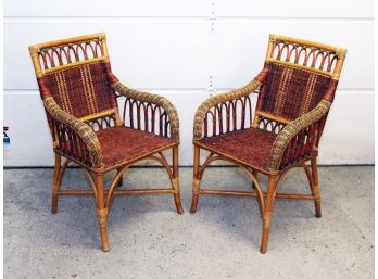 A Pair Of Rattan And Wicker Arm Chairs