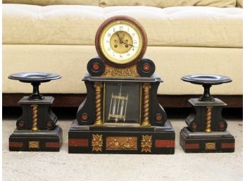 A 19th Century French Marble Inlay Mantle Clock And Pedestals With Ormolu Trim