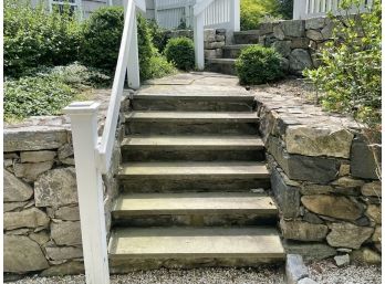 A Bluestone Slab Staircase And Connecting Landing