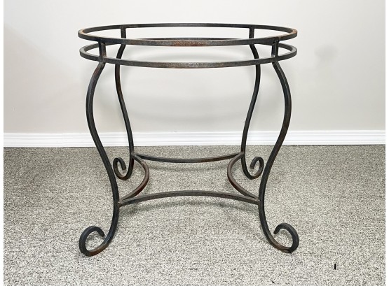 A Wrought Iron Plater Or Table Base