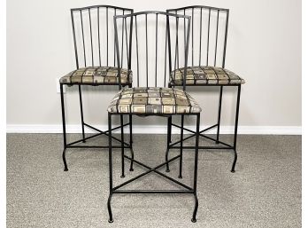 A Trio Of Wrought Iron Bar Stools By Crate & Barrel