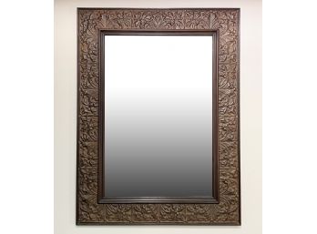 A Large, Embossed Tin Framed Mirror