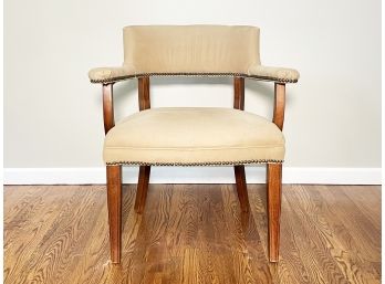 An Upholstered Armchair With Nailhead Trim By Crate & Barrel