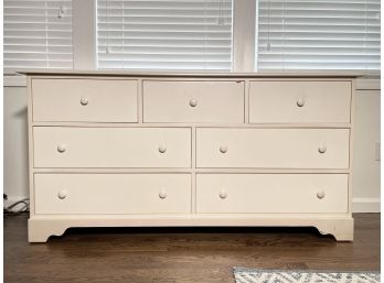 A Painted Wood Dresser In Antique White