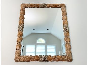 A Large Carved Wood Framed Mirror By Louis Solomon