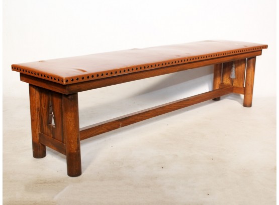 A Leather Top Oak Bench In Arts And Crafts Style