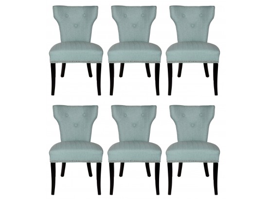 A Set Of Upholstered Linen Dining Chairs With Nailhead Trim