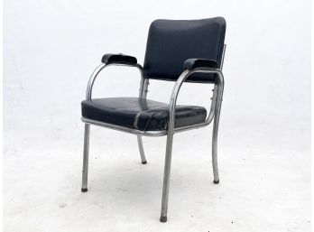 A Vintage 1950's Vinyl And Chrome Arm Chair