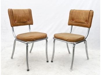 A Pair Of 1950's Vinyl And Chrome Chairs