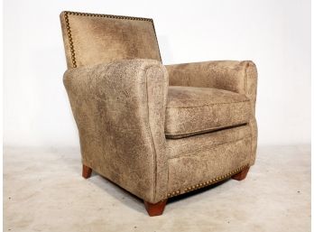 A Leather Upholstered Armchair With Nailhead Trim