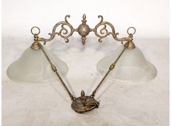 An Antique Brass And Glass Library Fixture