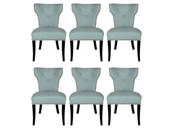 A Set Of Upholstered Linen Dining Chairs With Nailhead Trim