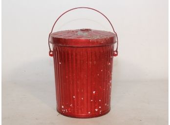 A Red Painted Metal Trash Can
