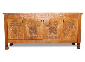 A Hand Carved Credenza By Morrelli Furniture