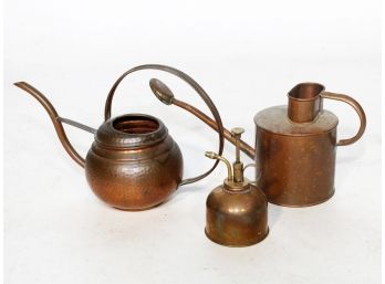 A Trio Of Vintage Copper Watering Vessels