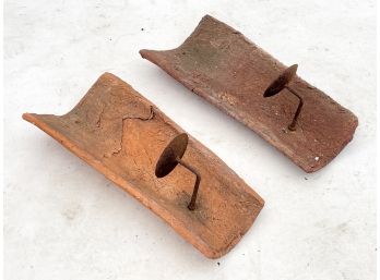 A Pair Of Terra Cotta And Metal Wall Sconces
