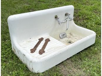 An Antique Cast Iron Sink