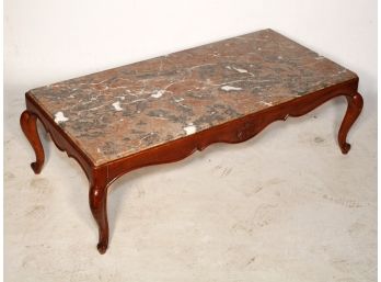 An Antique Marble Top Coffee Table