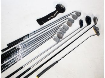 A Large Collection Of Golf Clubs