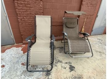 Two Indoor Outdoor Lounge Chairs
