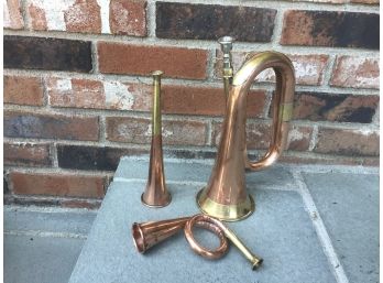 Three Brass And Copper Colored Horns