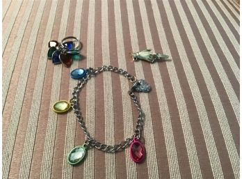 A Trio Of Jewelry - Ring, Pin, And Disney Bracelet - Lot #6