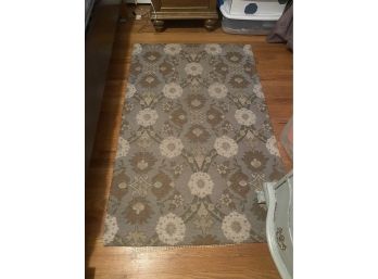 Grey Flowered Area Rug With Rust, Green And White Accents