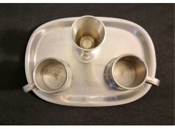 Pewter Mini Mugs On A Tray And A Goblet