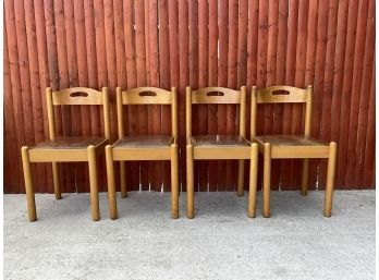 Four MCM Wood & Vinyl Dining Chairs