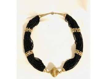 Southwest Style Silvertone And Multi-Strand Black Seed Bead Necklace
