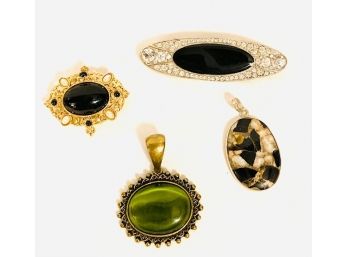 Collection Of Four Dark Stone Cabochon Brooches And Pendants