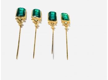 Four Vintage Paste Emerald Stick Pins