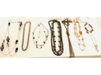 Eight Piece Jewelry Grouping - Metallics And More